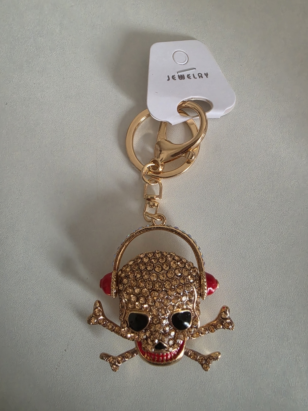 Gold Crystal Skull & Crossbones Keychain with Red Accents